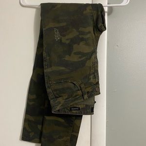 Camo skinny jeans. Never worn. Slight distressing